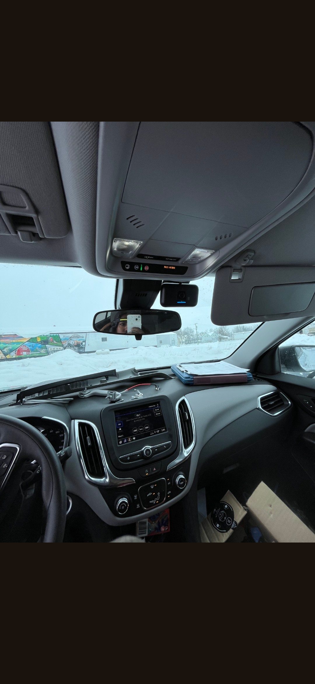 Last-mile delivery vehicle interior with dashcam install