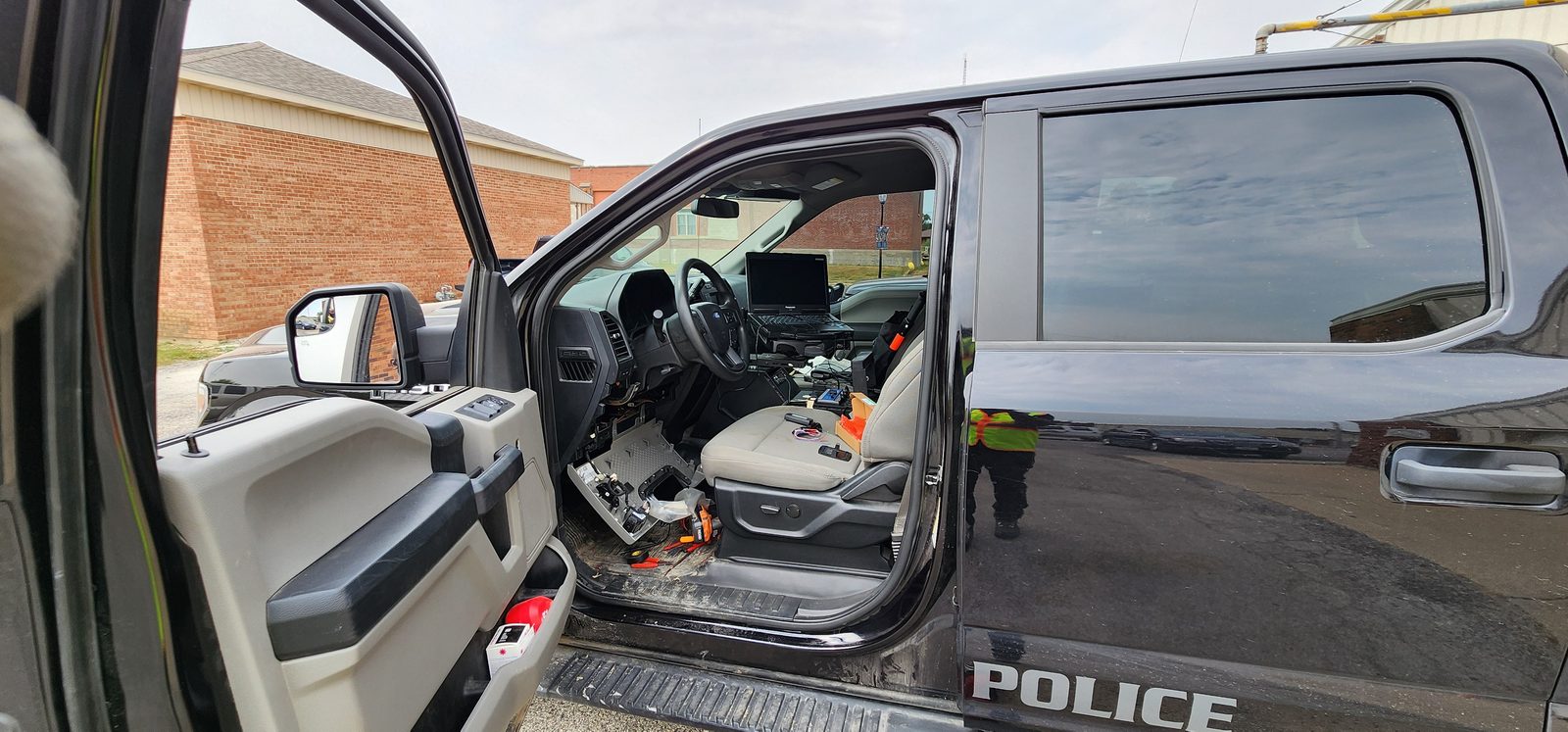 Police F-150 interior during a compliance and electronics install
